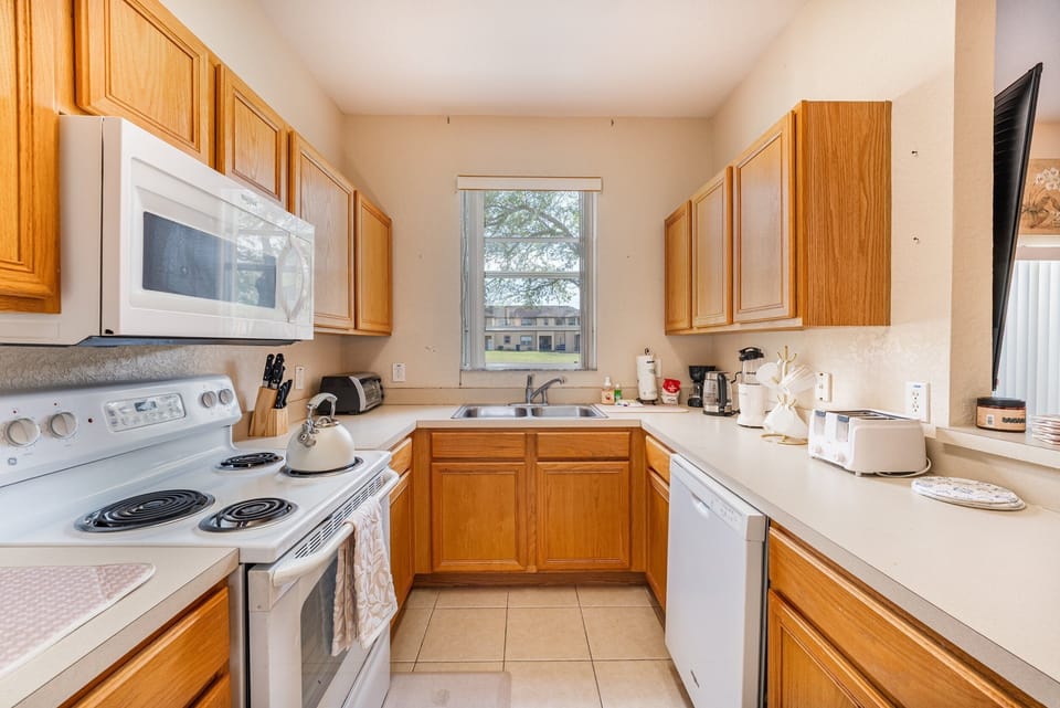 Galley style kitchen showing counter space and appliances