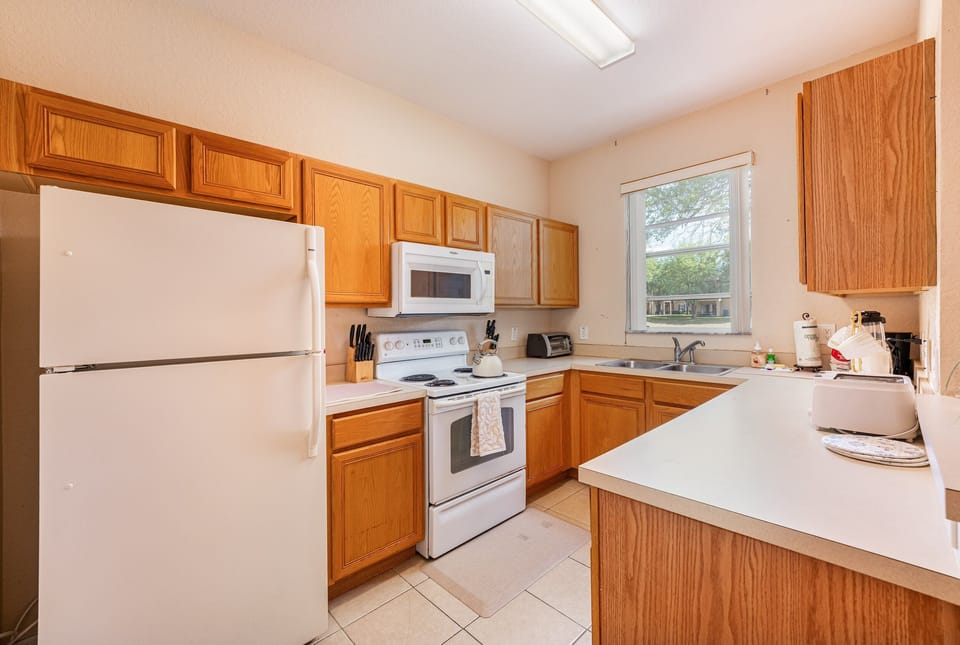 Galley style kitchen showing counter space and appliances