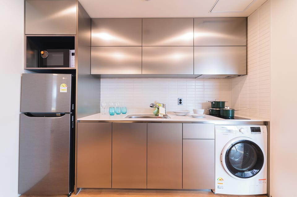 Family Apartment City View non Korean nationals only | Private kitchen | Fridge, microwave, stovetop, rice cooker