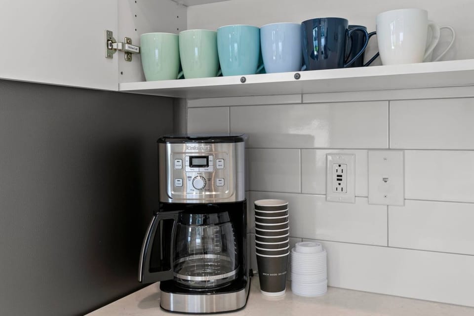 Fully stocked with cookware, utensils, Coffee station and essentials.
