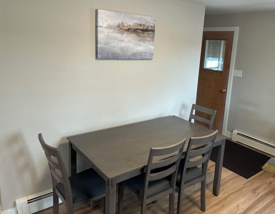 Dining room table with 4 chairs & a bench