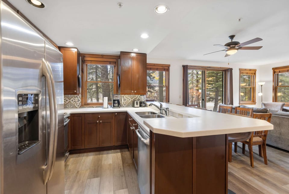 Kitchen: Drip coffee maker, Crockpot, blender, waffle maker, toaster, cooking utensils, tableware