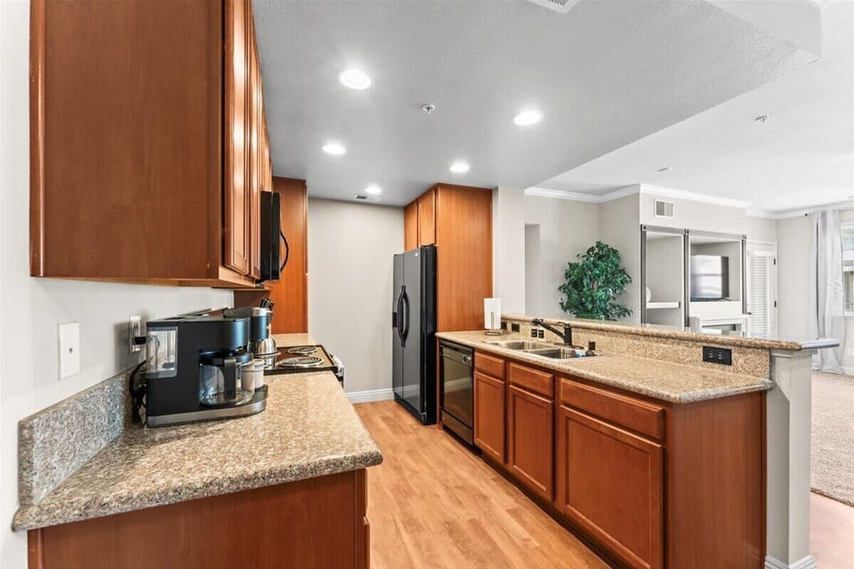 Everything you need to cook and dine comfortably — full-size appliances, cookware, and a modern layout.