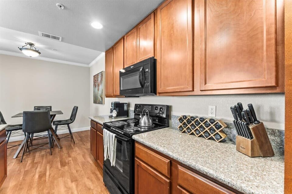 Everything you need to cook and dine comfortably — full-size appliances, cookware, and a modern layout. 