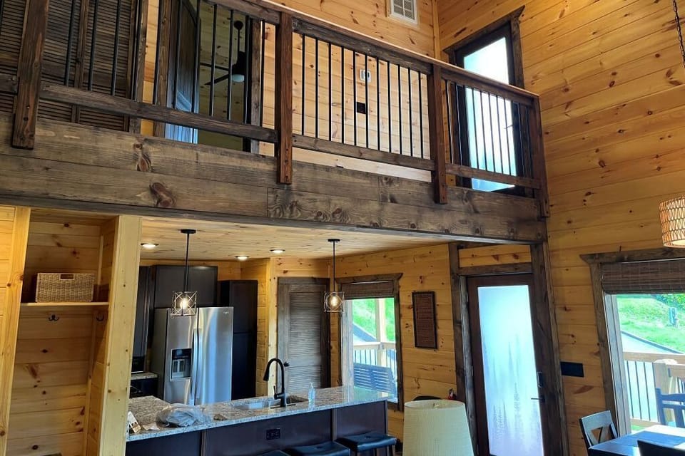 View of kitchen and upper balcony