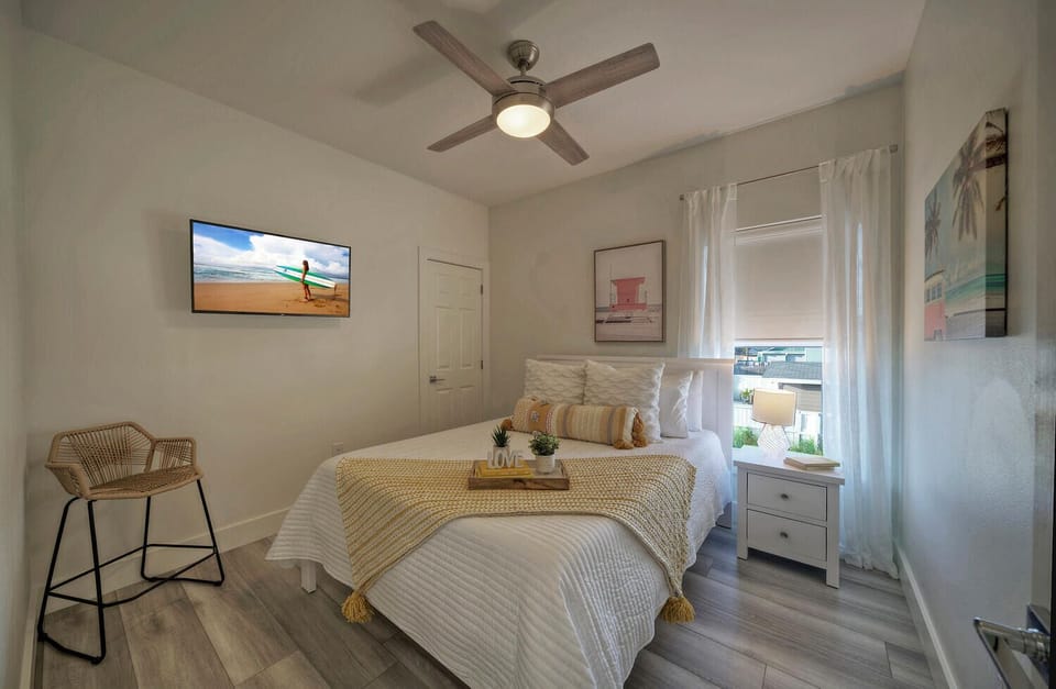 Bedroom 3 features queen bed and tv. (Alright, Alright, Alright)