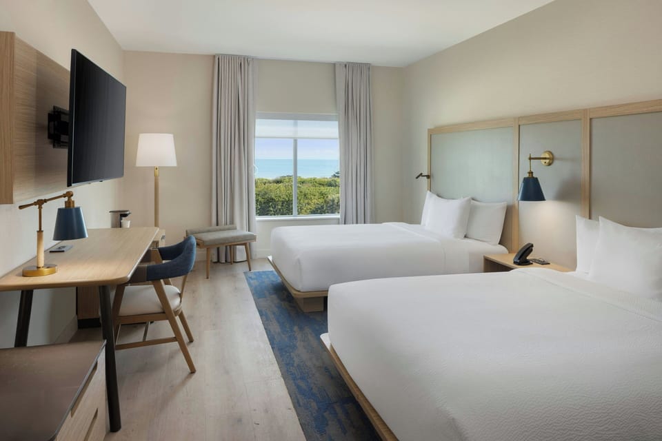 Deluxe Room, 2 Queen Beds, Ocean View | Desk, laptop workspace, blackout drapes, iron/ironing board