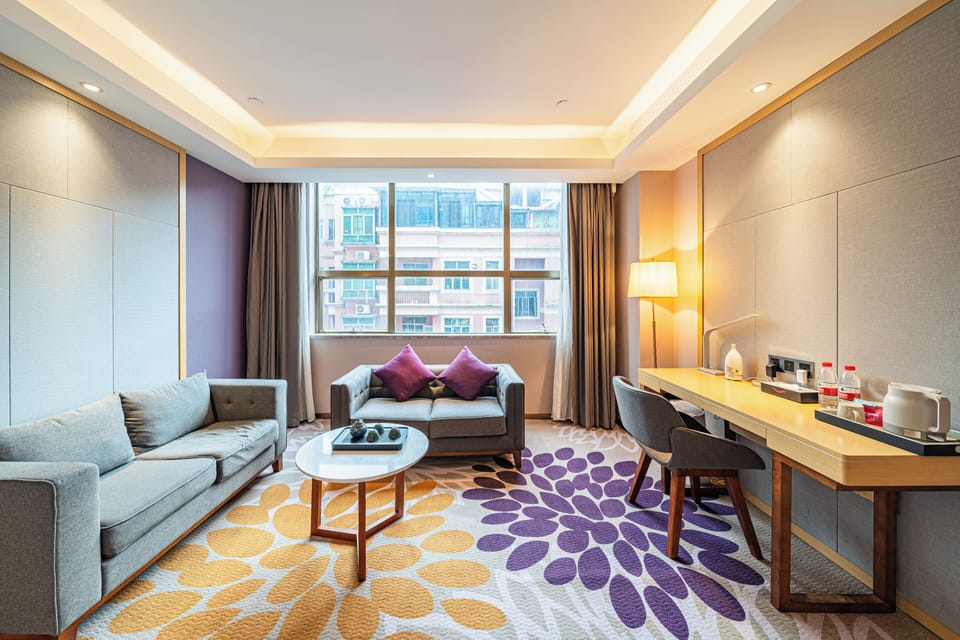 Luxury Double Room, City View | Living area | 50-inch TV with satellite channels