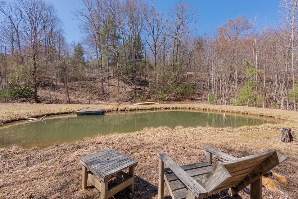 Lakeside seating for peaceful mornings, sunsets, or stargazing by the pond.