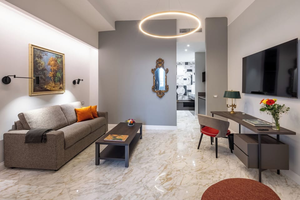 Deluxe Apartment, Balcony, City View | In-room safe, blackout drapes, iron/ironing board