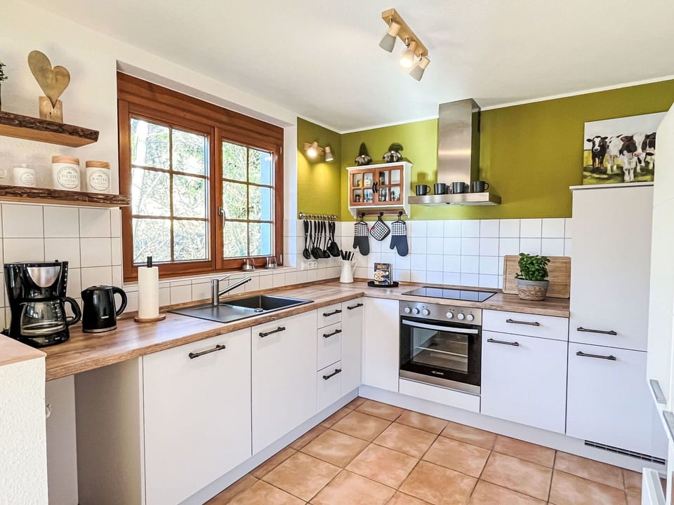 Kitchen, Kitchen Appliance, Countertop, Cabinetry, Interior Design, Furniture, Major Appliance, Flooring, Wood, Home Appliance