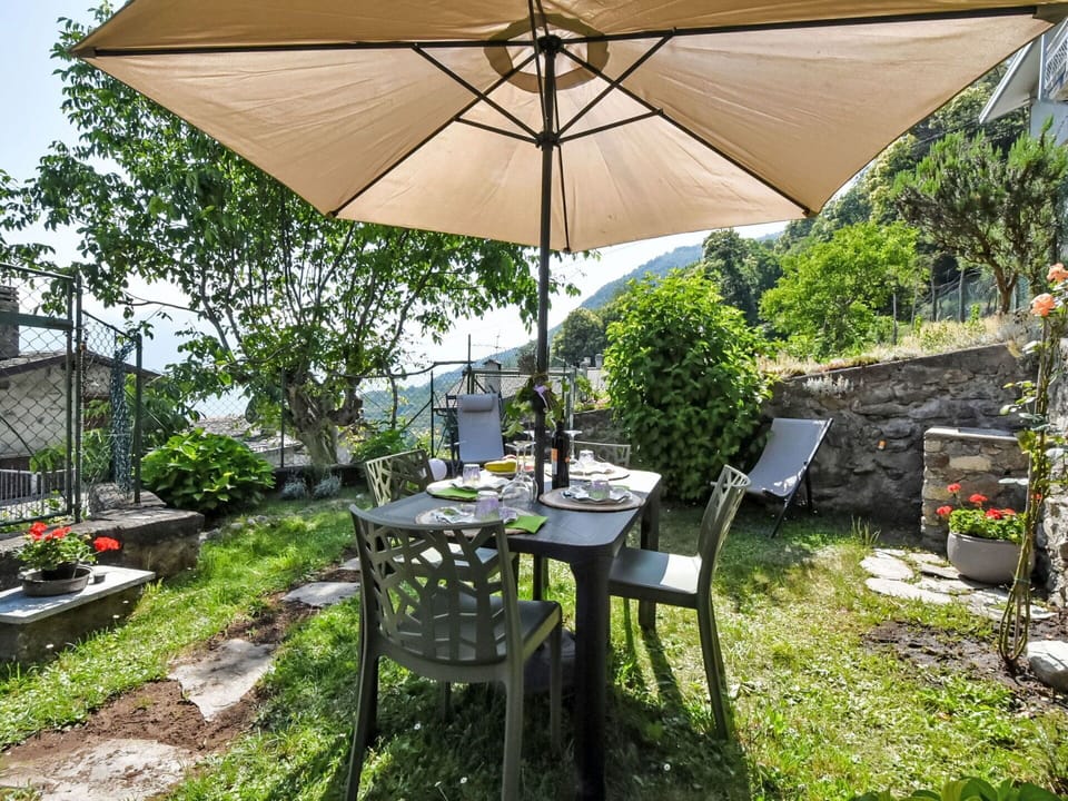 Furniture, Outdoor Furniture, Umbrella, Chair, Table, Outdoor Table, Kitchen & Dining Room Table, Shade, Patio, Garden