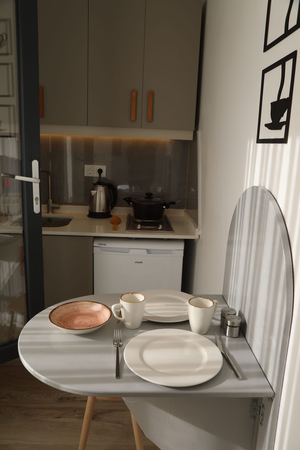 Mini-fridge, stovetop, coffee/tea maker, electric kettle