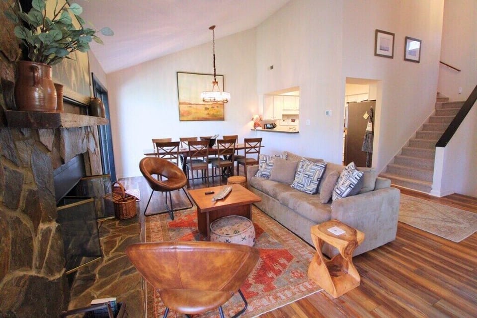 The open-concept living and dining area provides plenty of space for everyone to relax, dine, and spend time together.