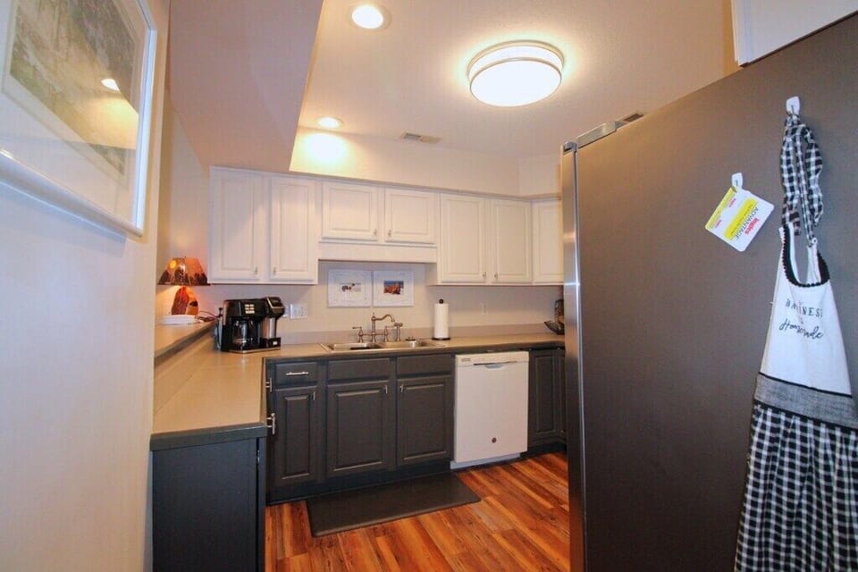 The updated kitchen is fully equipped with everything you need to prepare meals and enjoy time together.