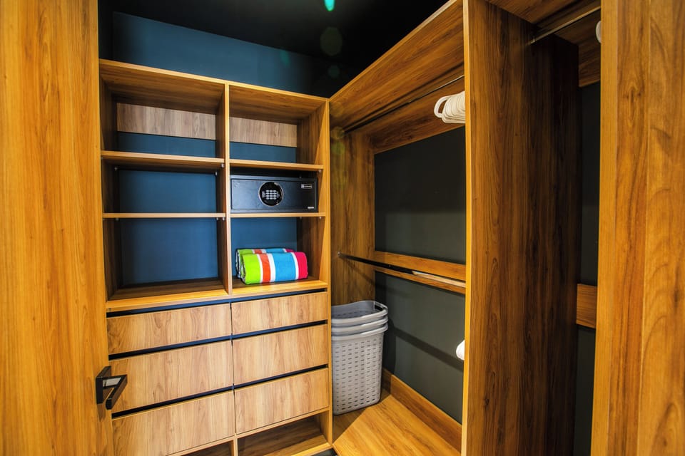 Spacious walk-in closet with safety deposit box for your belongings