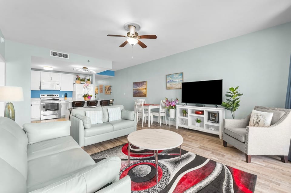 Open living area with modern kitchen and comfortable seating