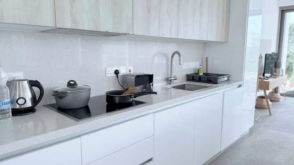 Fully equipped kitchen with coffee machine, toaster, microwave and many more