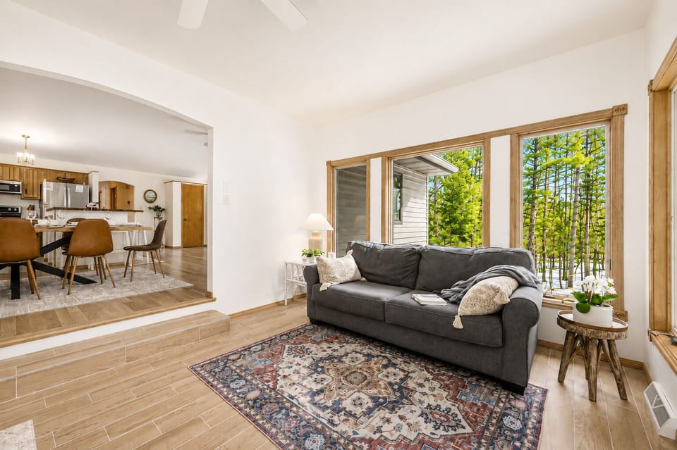 Sunroom. Cozy sofa for book lovers. 