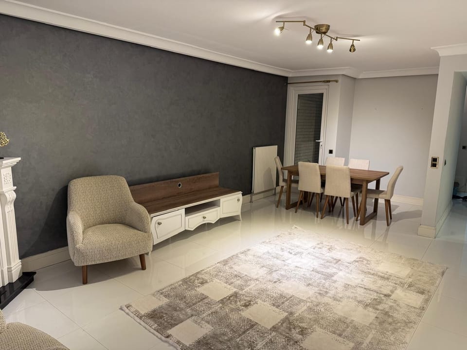 Luxury Apartment, Garden View | Living area | 55-inch Smart TV with satellite channels, Netflix, first-run movies