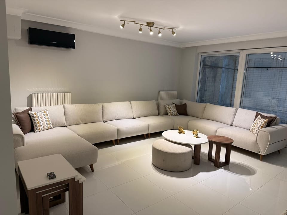 Luxury Apartment, Garden View | Living area | 55-inch Smart TV with satellite channels, Netflix, first-run movies