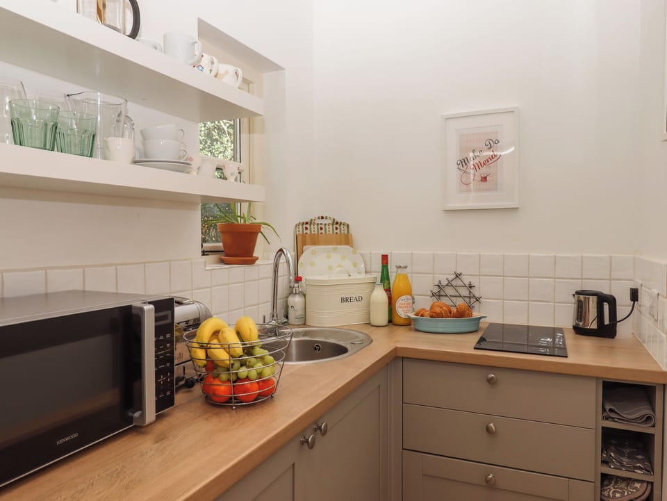 Fridge, microwave, toaster, cookware/dishes/utensils