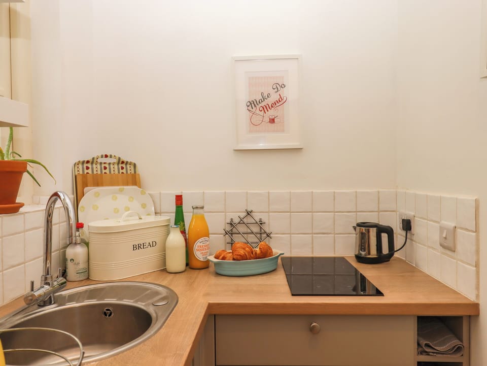 Fridge, microwave, toaster, cookware/dishes/utensils