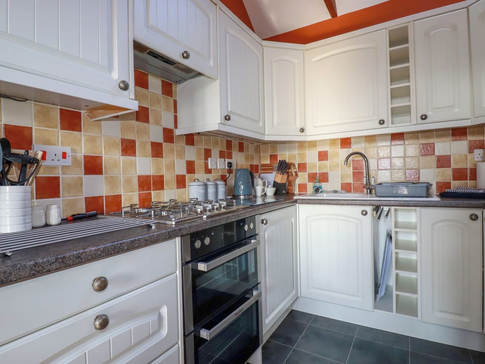 Fridge, microwave, toaster, cookware/dishes/utensils