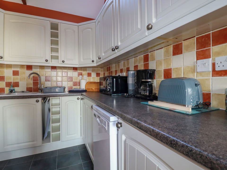 Fridge, microwave, toaster, cookware/dishes/utensils