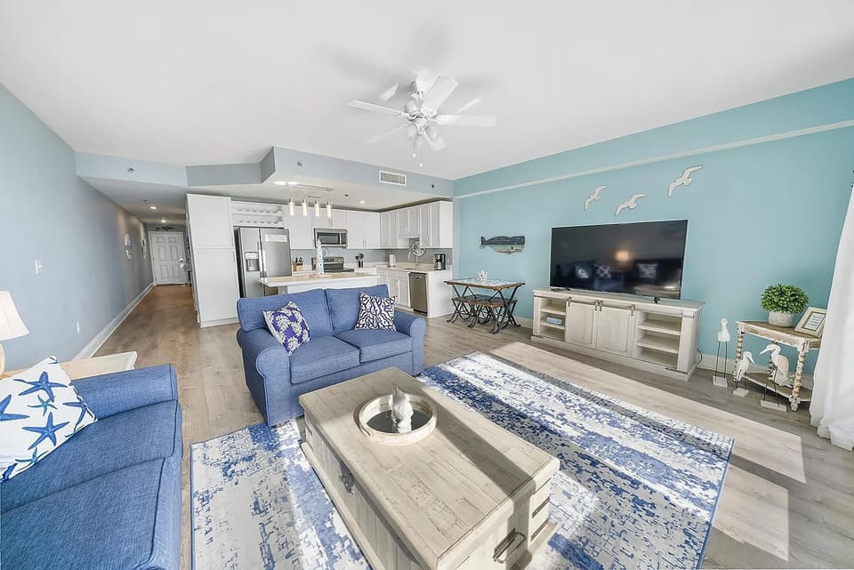 Condo, 1 King Bed with Sofa bed (Laketown Wharf 905) | Living area | TV