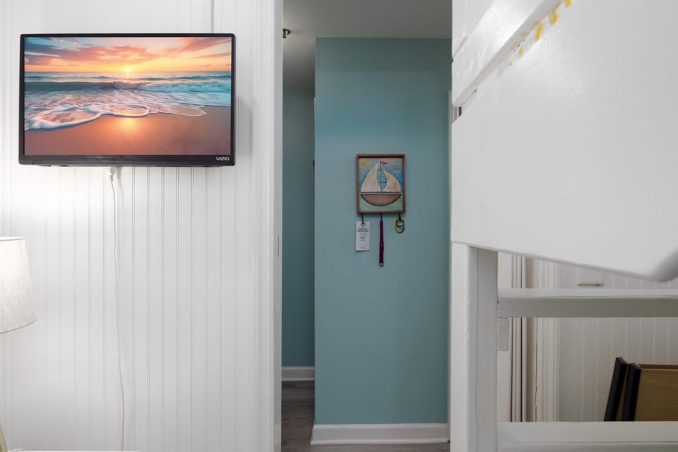 Coastal-inspired decor throughout the condo