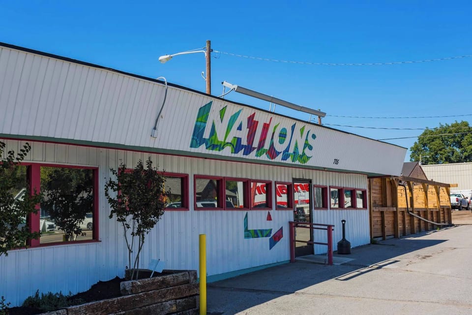 Nations storefront row with local shops