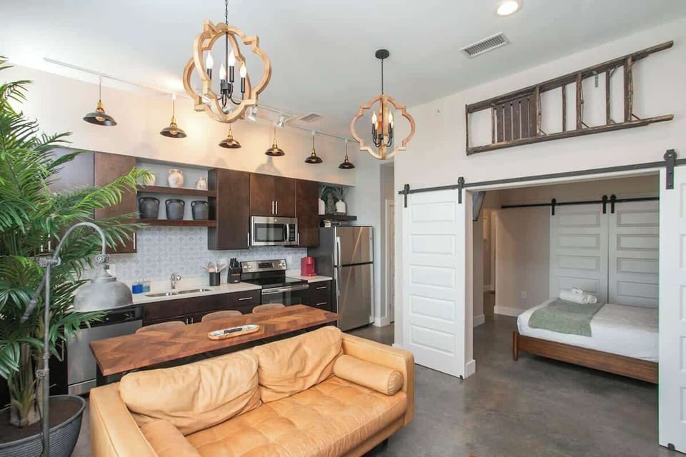 Living area opens straight onto the full kitchen