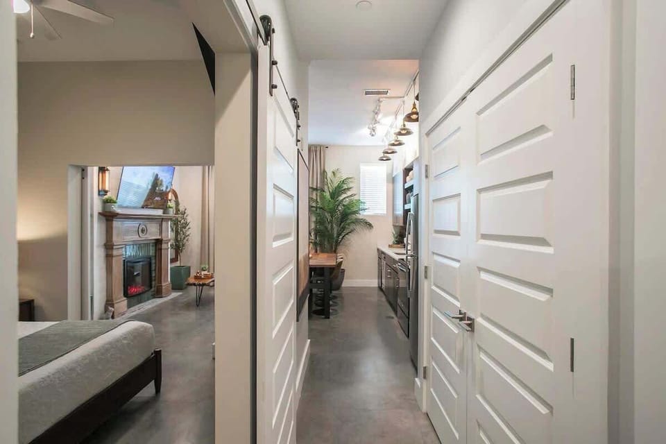 Hallway linking the bedroom, bathroom and living space
