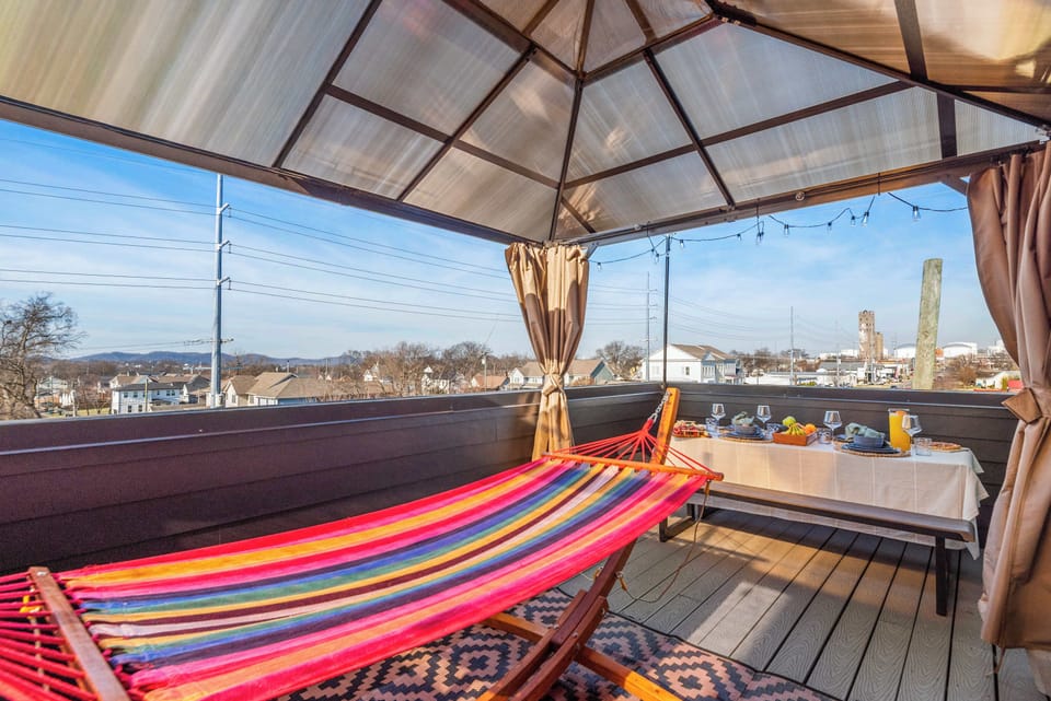 Rooftop deck with colorful hammock chair