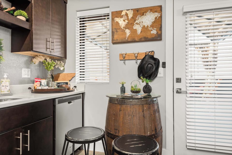 High-top table with map wall art