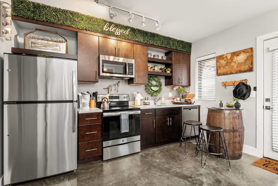Kitchen counter with stove and refrigerator