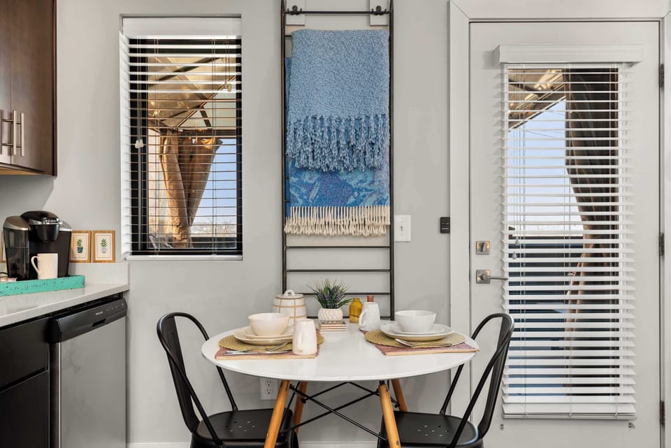 Closet nook with curtain and hanging storage