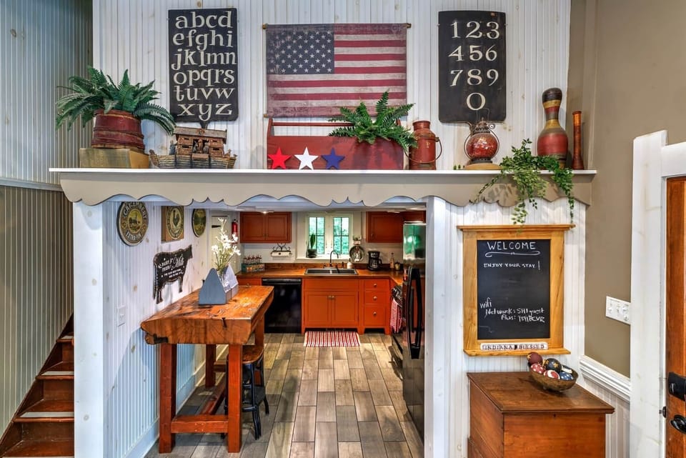 Playful alphabet, flag, and vintage details celebrate the building’s schoolhouse history