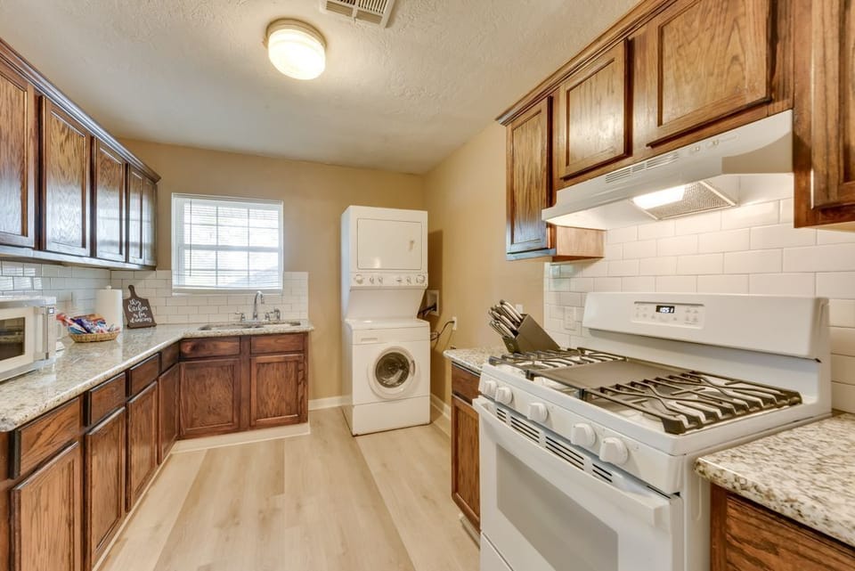 Fully-Equipped Kitchen with Laundry Area