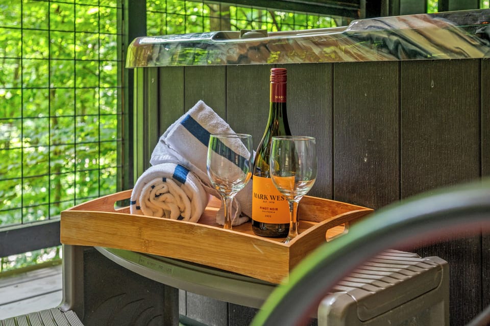 Relax the day away on the lower level covered deck in the spa