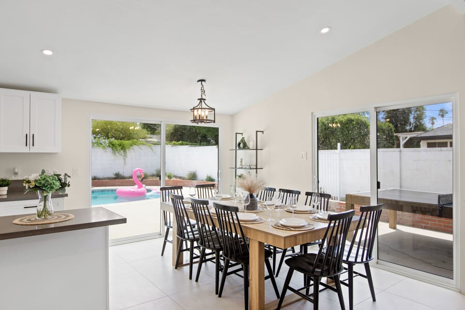 Open dining area with backyard views and natural sunlight