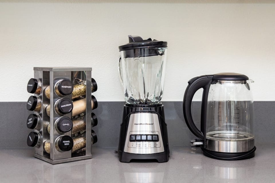 Coffee and smoothie station with blender and essentials for mornings