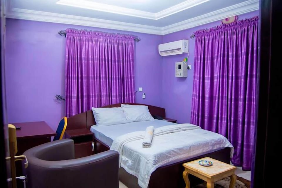 Economy Room, Balcony, City View | Desk, laptop workspace, blackout drapes, soundproofing