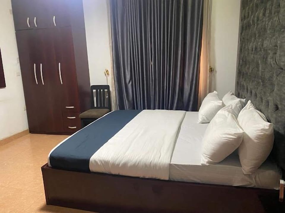 Economy Room, Balcony, City View | Desk, laptop workspace, blackout drapes, soundproofing