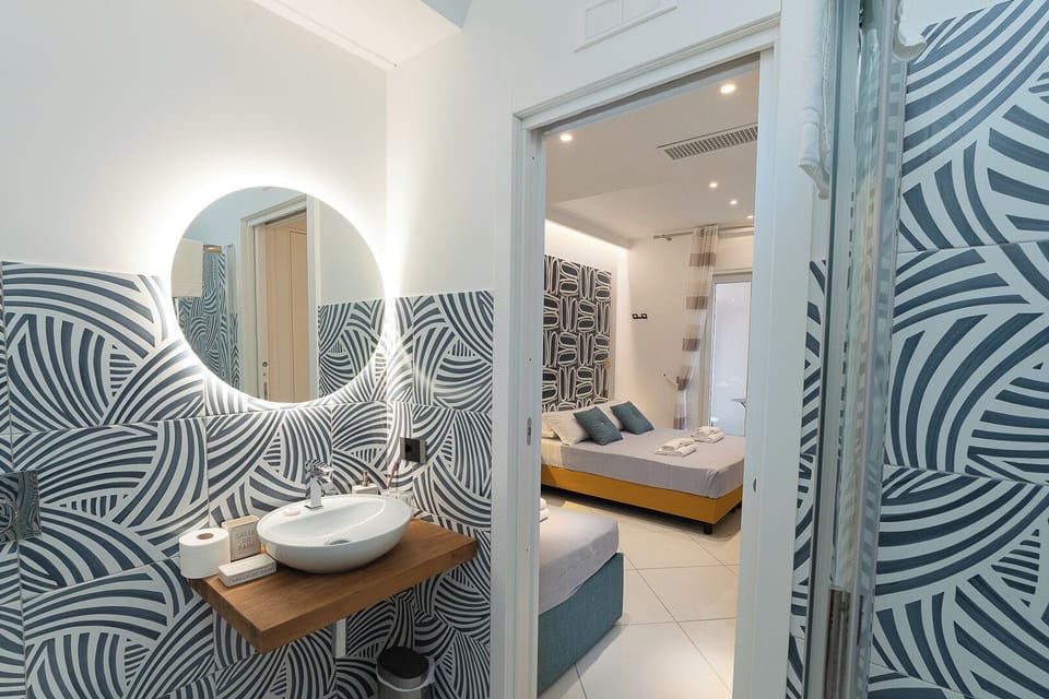 Superior Triple Room, Balcony | In-room safe, desk, free WiFi