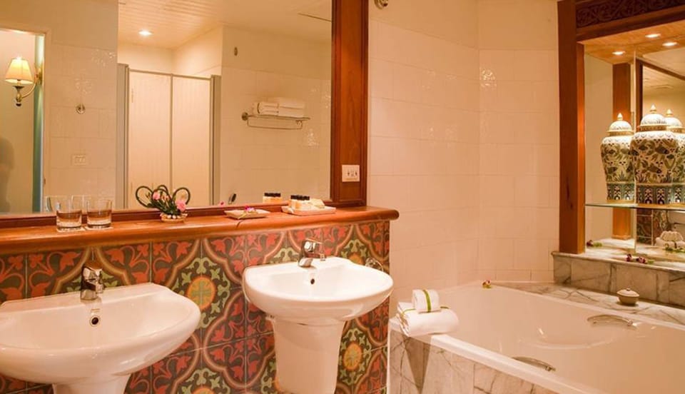 Superior Room, Bathtub, Pool View | Bathroom | Separate tub and shower, rainfall showerhead, free toiletries