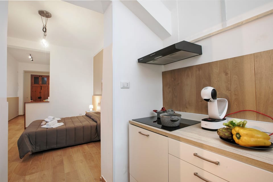 Family Apartment, Multiple Bedrooms (Dimora Cristina Apartment Bari) | Private kitchen | Fridge, oven, stovetop, coffee/tea maker