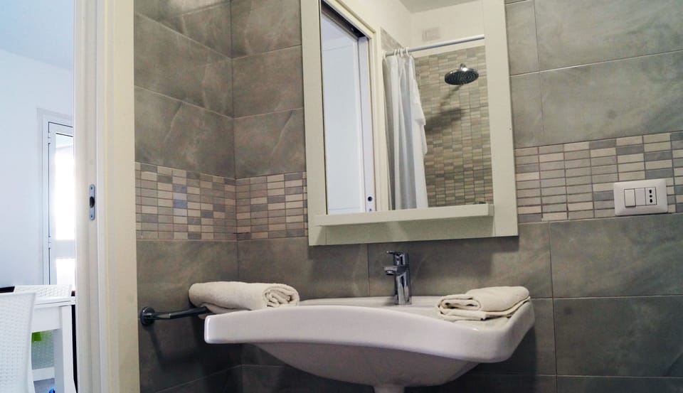 Superior Apartment, 1 Double Bed with Sofa bed | Bathroom | Shower, free toiletries, towels, soap