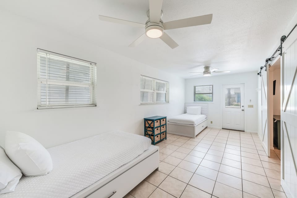 West building - Two twin beds with twin trundles perfect for kids or the young at heart! Access to the breezeway between the houses.